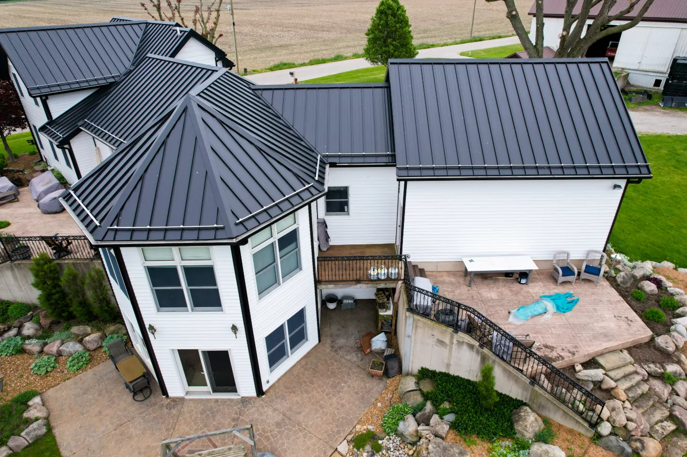 Tarping and dry-in on a Pheasant Run commercial roof